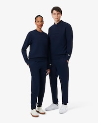 Pantal&oacute;n de ch&aacute;ndal con detalles de marca estampados en relieve