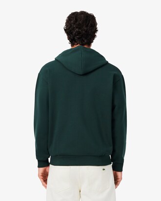Sudadera con capucha y cremallera con insignia