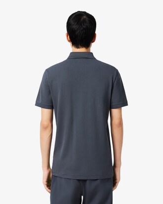 Polo Commuter de piqu&eacute; de corte ajustado con detalles de marca de jacquard