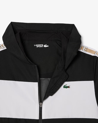 Chaqueta deportiva con bloques de color y cinta de logotipo