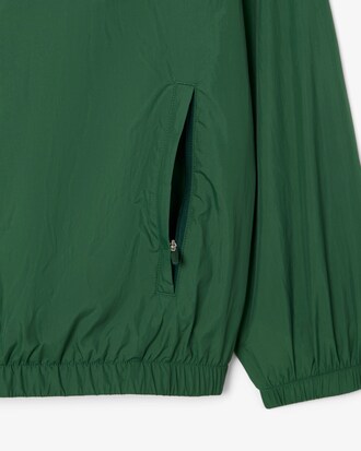 Chaqueta de chándal con capucha hidrófuga