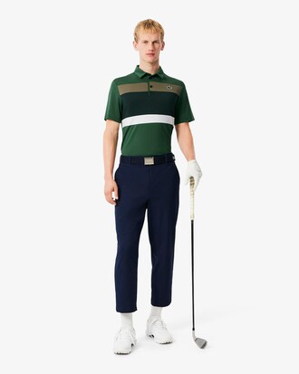 Polo de golf de corte regular con bloques de color