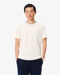 Camiseta de piqu&eacute; el&aacute;stico con cuello de rayas