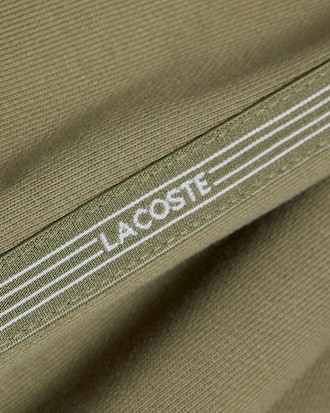 Pantal&oacute;n corto de felpa de corte regular con raya de logotipo