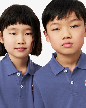 Polo de petit piqué con detalles de encaj