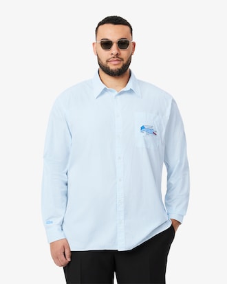 Camisa de corte holgado con insignia de cocodrilo