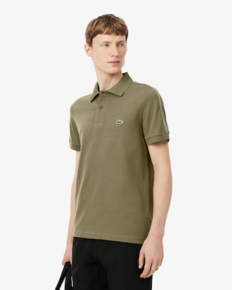 Polo de rayas con logotipo de corte regular