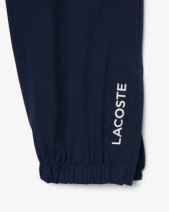 Pantal&oacute;n de ch&aacute;ndal deportivo hidr&oacute;fugo