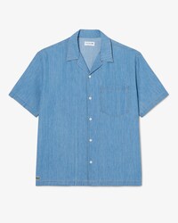 Camisa vaquera de cuello abierto y corte holgado