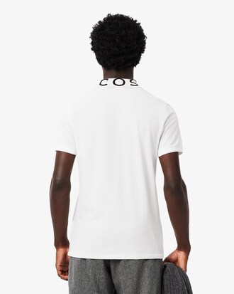 Polo de corte ajustado con detalles de marca en jacquard