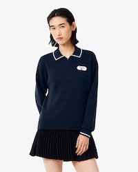 Jersey con cuello polo y cremallera con insignia de tenis retro