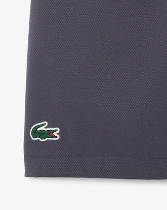 Pantal&oacute;n corto deportivo de tafet&aacute;n de rombos