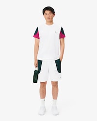 Pantal&oacute;n corto deportivo hidr&oacute;fugo con bloques de color