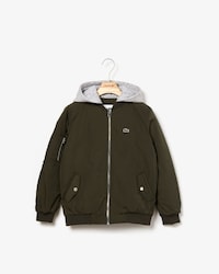 Chaqueta bómber de niño en nylon con capucha de felpa a contraste