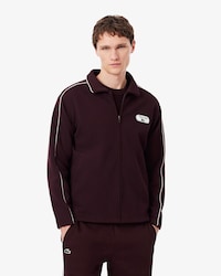 Sudadera de tenis retro con cremallera e insignia