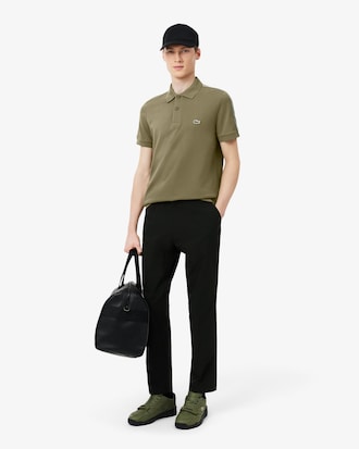 Polo de rayas con logotipo de corte regular