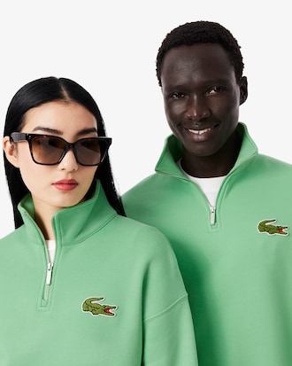 Sudadera con cremallera en el cuello de corte amplio con detalle de insignia
