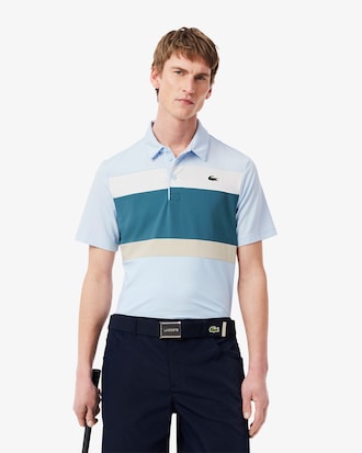 Polo de golf de corte regular con bloques de color