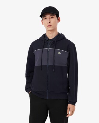 Sudadera con capucha y cremallera con bloques de color