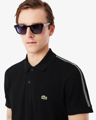 Polo de rayas con logotipo de corte regular