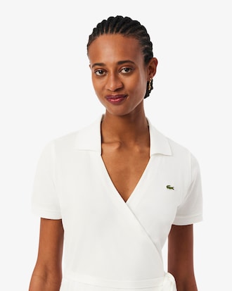 Vestido polo cruzado de minipiqu&eacute; el&aacute;stico