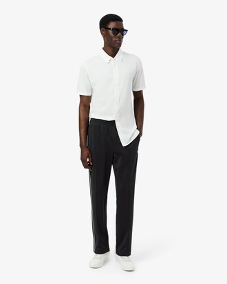 Pantal&oacute;n de ch&aacute;ndal de piqu&eacute; con ribete en contraste