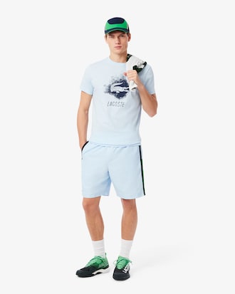 Pantalón corto de tenis ligero de rayas con bloques de color