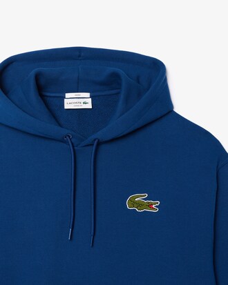 Sudadera con capucha de corte holgado con detalle de insignia