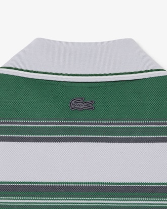 Polo de piqu&eacute; de rayas de corte holgado Lacoste x Wang Yibo
