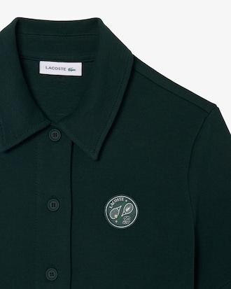 Vestido de tenis de piqu&eacute; con cuello polo e insignia