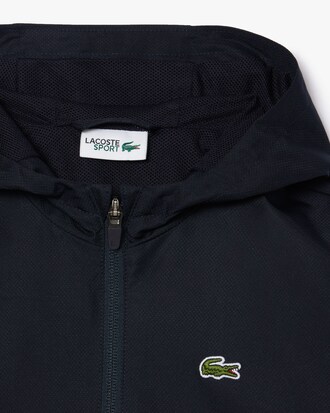 Chaqueta deportiva con capucha y cremallera