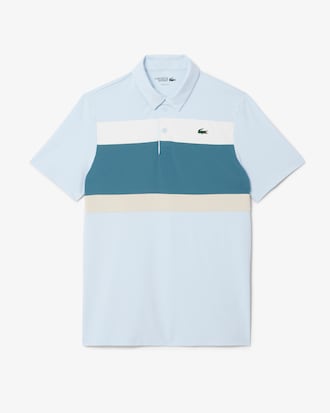 Polo de golf de corte regular con bloques de color