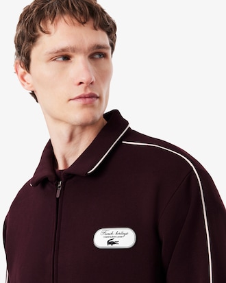 Sudadera de tenis retro con cremallera e insignia