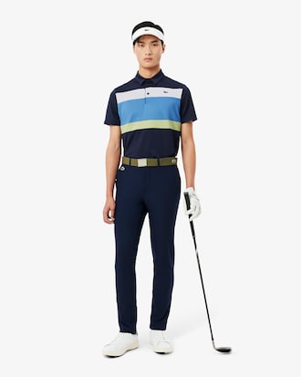Polo de golf el&aacute;stico con bloques de color Ultra-Dry
