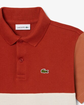 Polo de petit piqué con bloques de color