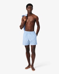 Short de ba&ntilde;o de largo medio con estampado de monograma