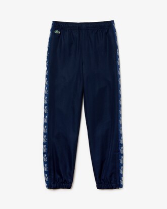 Pantal&oacute;n de deporte de ni&ntilde;o Lacoste SPORT Tennis con franja y estampado de cocodrilo