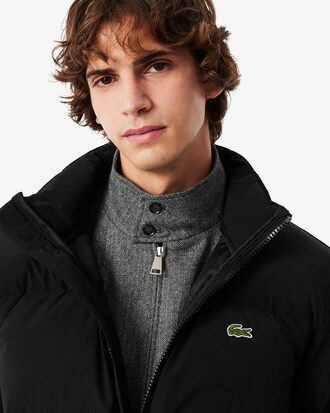 Chaqueta acolchada con capucha hidrófuga