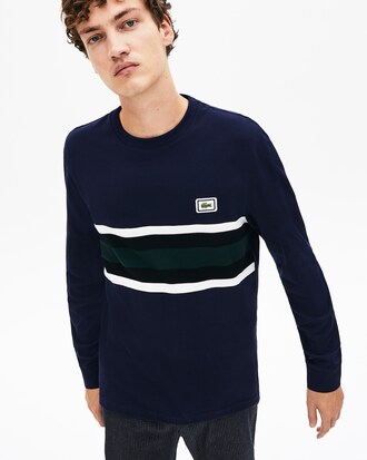 Camiseta de hombre en algodón de rayas con cuello redondo e insignia