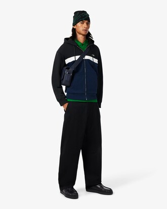 Sudadera con capucha y cremallera con bloques de color