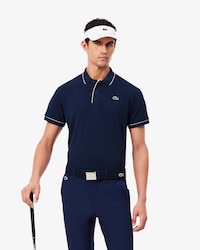 Polo de golf de minipiqu&eacute; termorregulador
