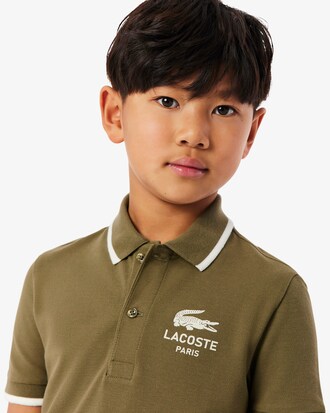 Polo de petit piqu&eacute; con cuello de rayas