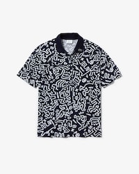 Polo Keith Haring relaxed fit minipiqu&eacute; estampado