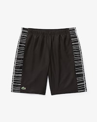 Pantal&oacute;n corto de hombre Lacoste SPORT Tennis con franjas laterales estampadas