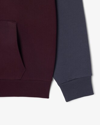 Sudadera con capucha y cremallera con bloques de color