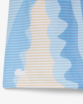 Short de ba&ntilde;o de rayas de largo medio