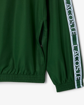 Chaqueta deportiva con bloques de color y cinta de logotipo