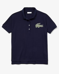 Polo de mujer relaxed fit en piqu&eacute; fluido con insignia de cocodrilos