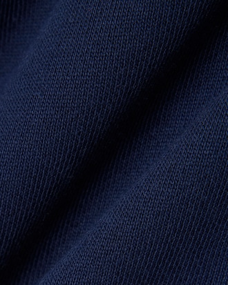 Pantal&oacute;n de ch&aacute;ndal con detalles de marca estampados en relieve