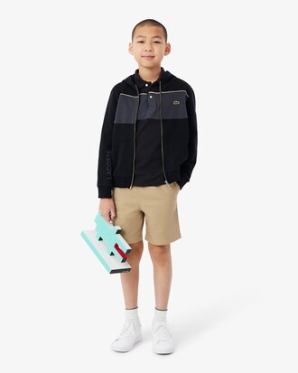 Polo de petit piqu&eacute; con bloques de color